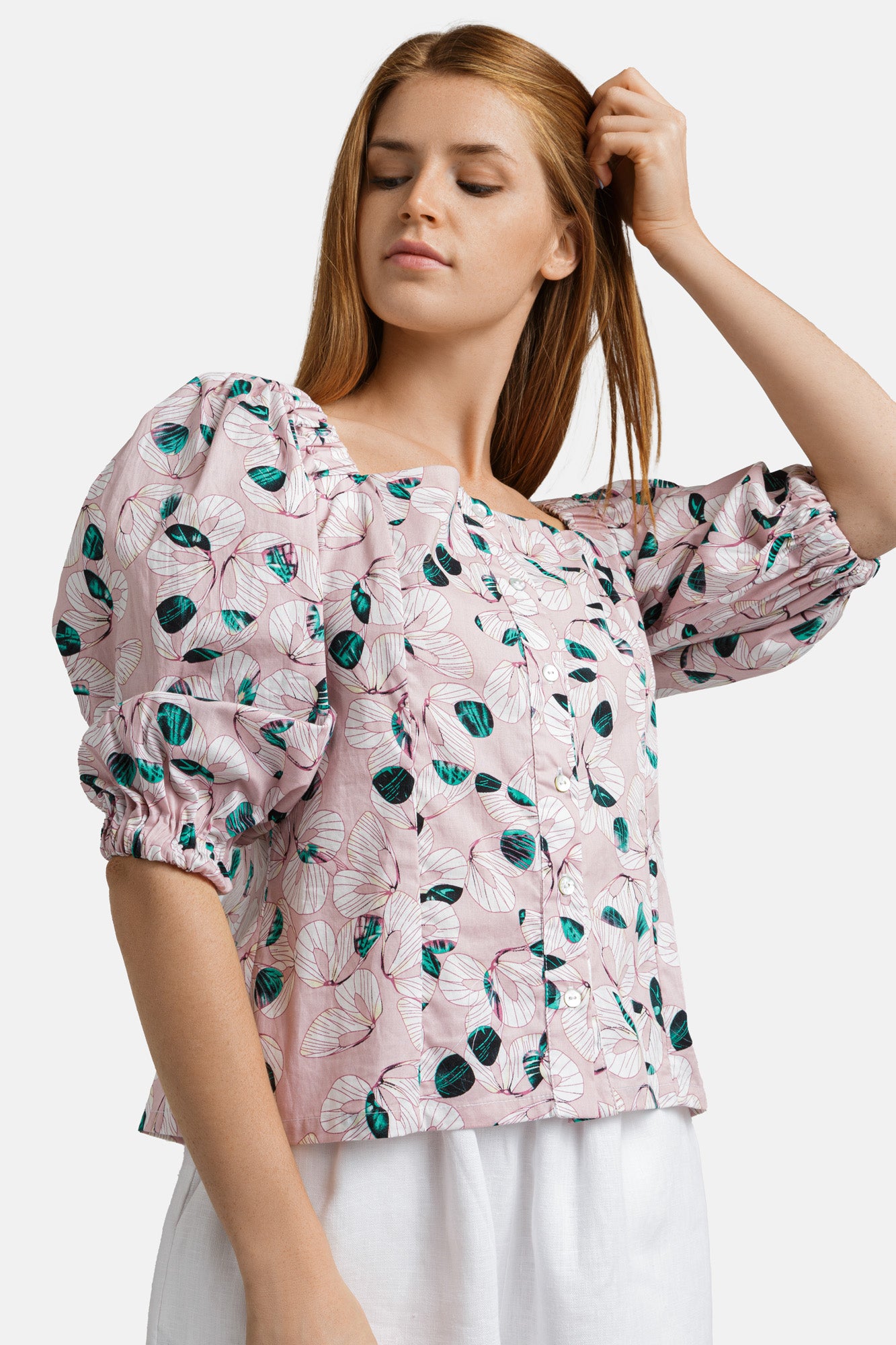 Printed cotton blouse with mother-of-pearl button closure and voluminous 2/4 length sleeves .