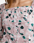 Printed cotton blouse with mother-of-pearl button closure and voluminous 2/4 length sleeves .