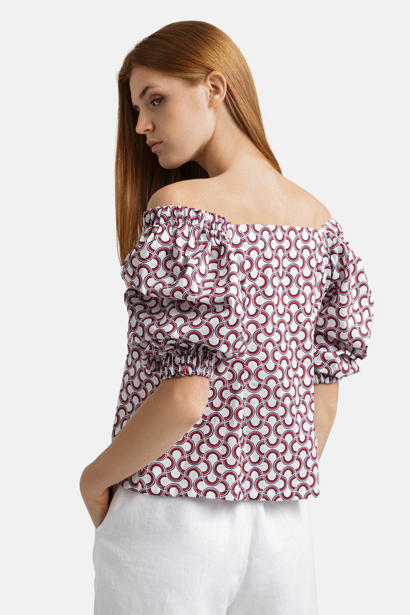 Printed cotton blouse with mother-of-pearl button closure and voluminous 2/4 length sleeves .