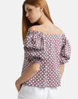 Printed cotton blouse with mother-of-pearl button closure and voluminous 2/4 length sleeves .