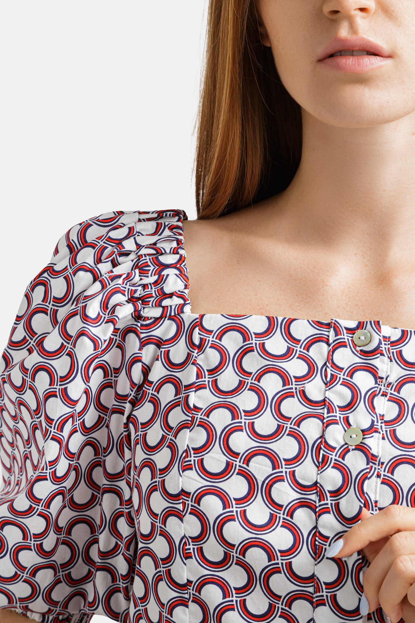 Printed cotton blouse with mother-of-pearl button closure and voluminous 2/4 length sleeves .