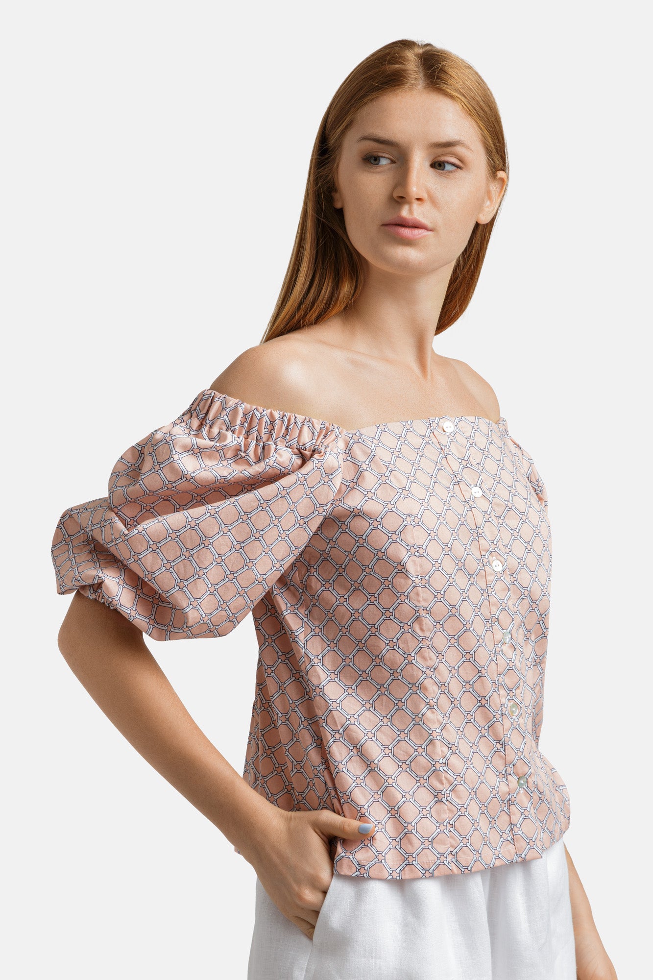 Printed cotton blouse with mother-of-pearl button closure and voluminous 2/4 length sleeves .