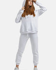 Fouter fleece hoodie with drawstring hood, muffle pocket, and straight hem.