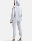 Fouter fleece hoodie with drawstring hood, muffle pocket, and straight hem.